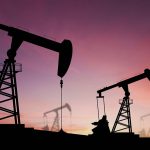 oil-drilling-rigs-heads-sunset