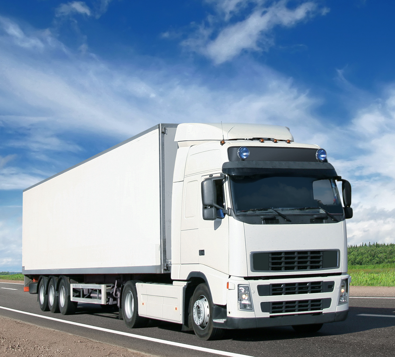 white truck on country highway