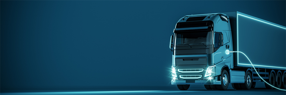 Blue electric truck connected to charger on blue background with